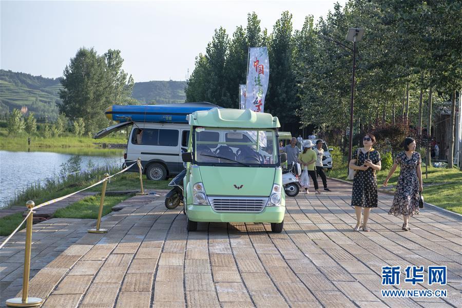 新华网|飞岭村：一个小山村的华丽转身