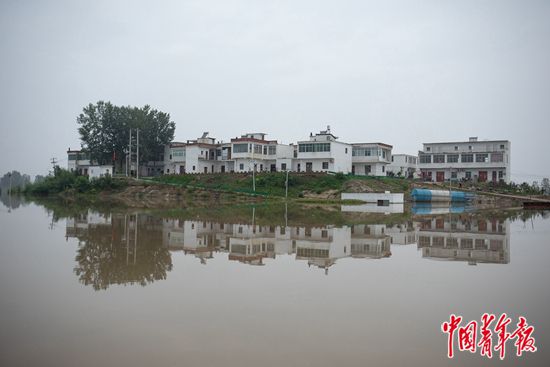 中国青年报|在蓄洪区 等洪水退去