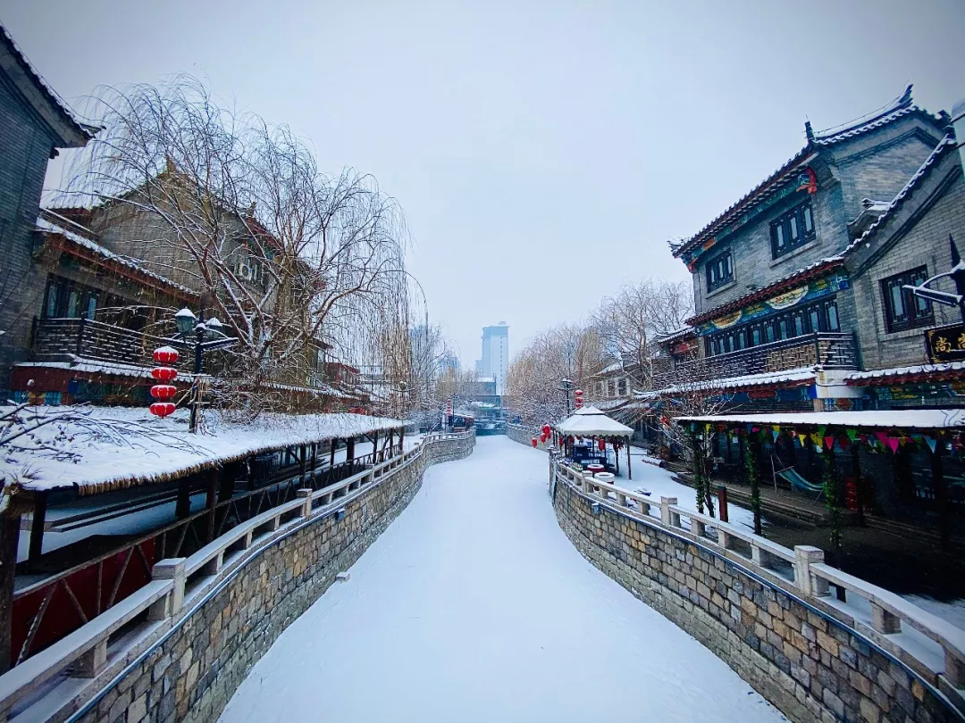 形容古城的雪景图片