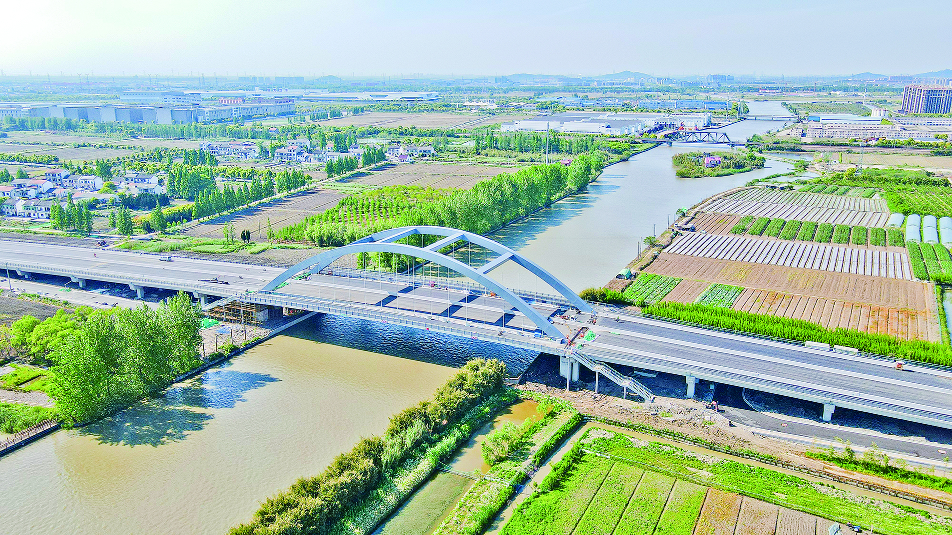 松江新城南部区域新增一条东西向主要交通干道金玉路跨油墩港工程进入