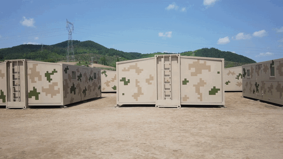 图片说明:折叠式箱房 央视截图